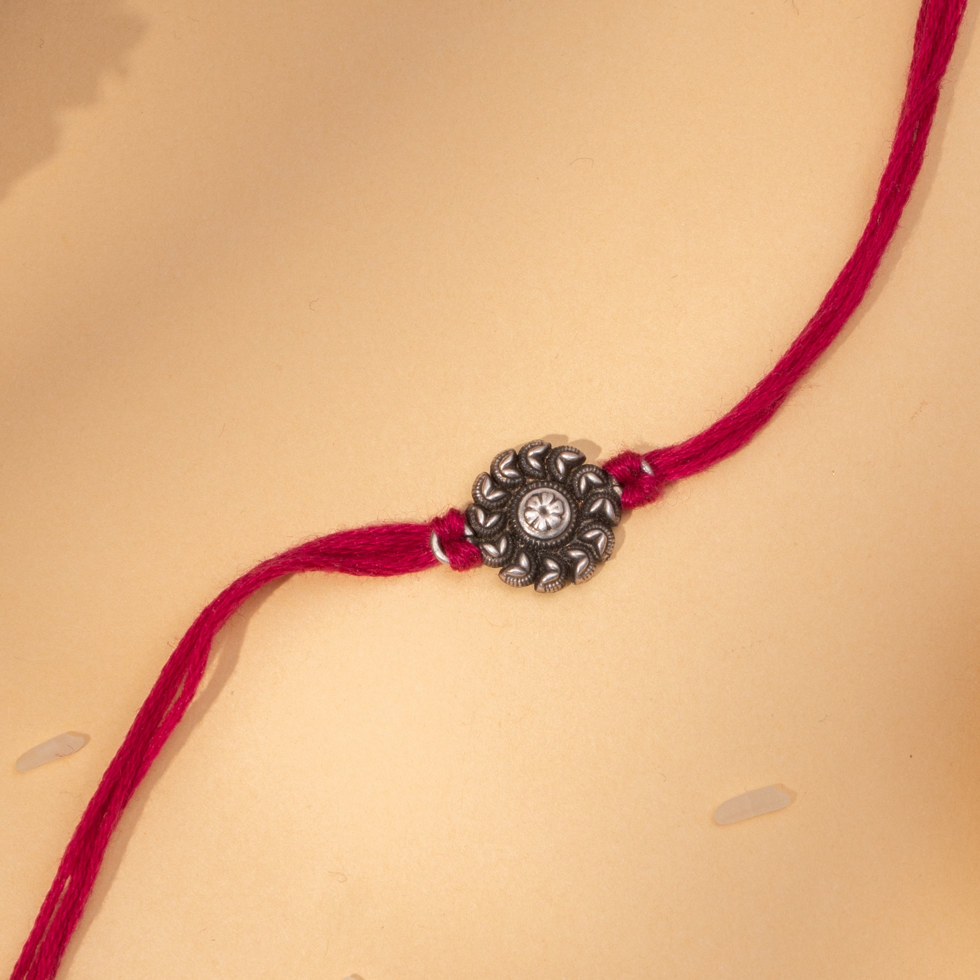 Silver Petal Rakhi
